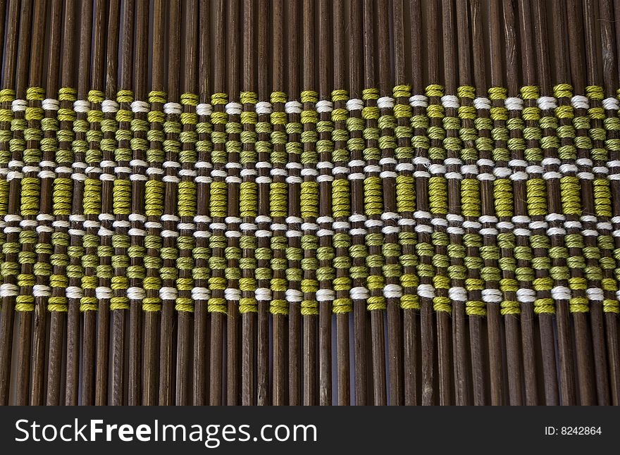 Woven background. Mat made out of bamboo pieces