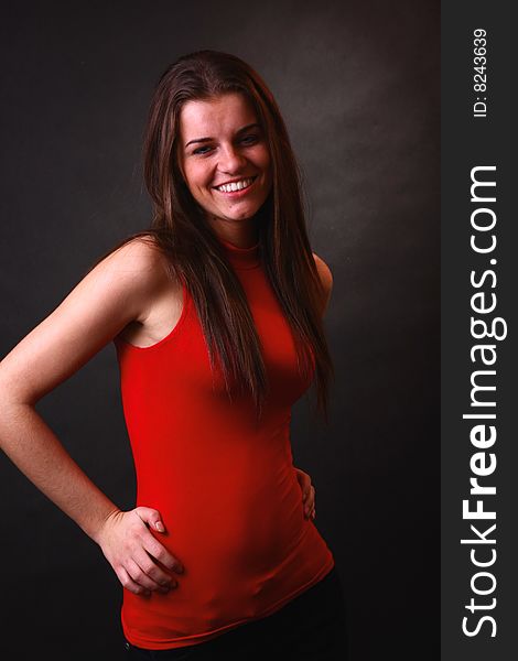 Young attractive girl in the soft studio light. Young attractive girl in the soft studio light.