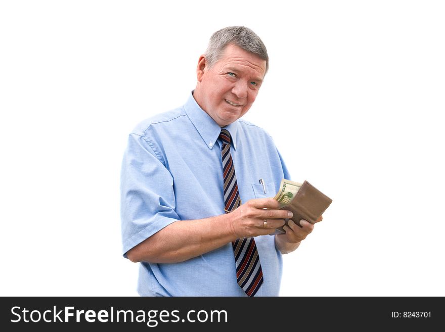 Mature businessman reluctantly paying a bill, isolated on white background.