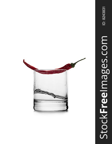 Red pepper and pepper tincture on a white background