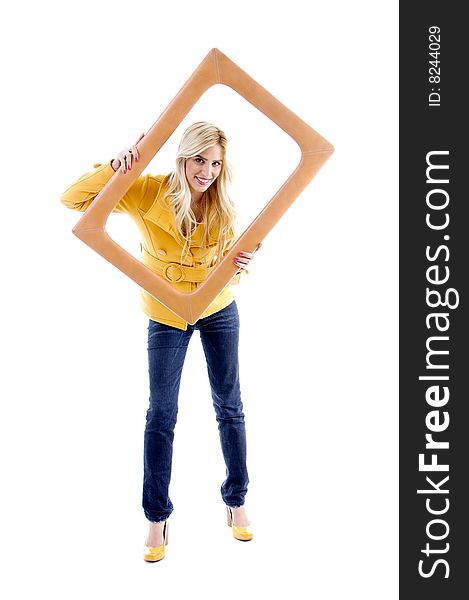 Front view of smiling model posing with frame on an isolated white background