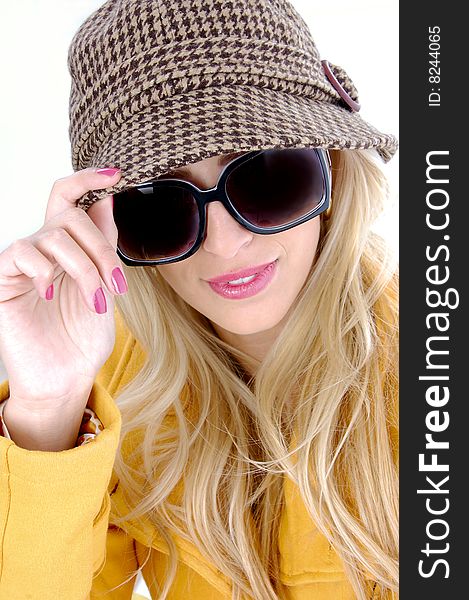 Front view of stylish female in sunglasses against white background