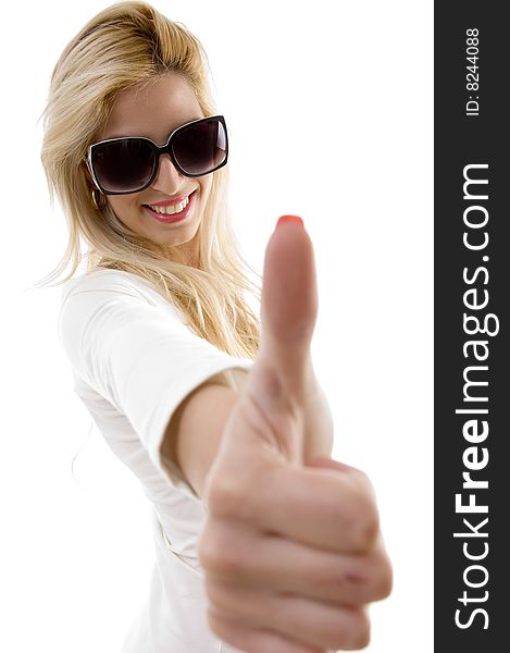 Side view of smiling woman showing thumbs up on an isolated background