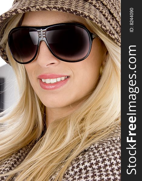 Front View Of Smiling Model Wearing Sunglasses