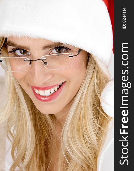 Front view of smiling woman in christmas hat