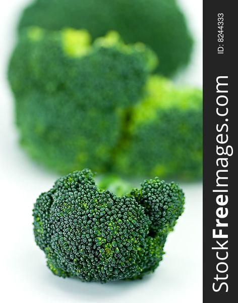 Green fresh broccoli food isolated on a white background.