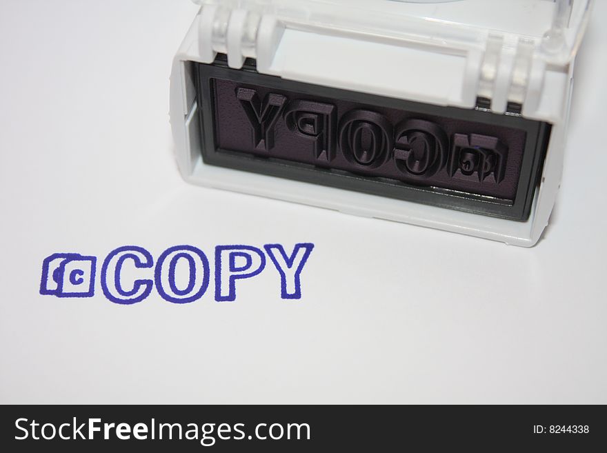 Copy stamp printer on sheet and has flip top