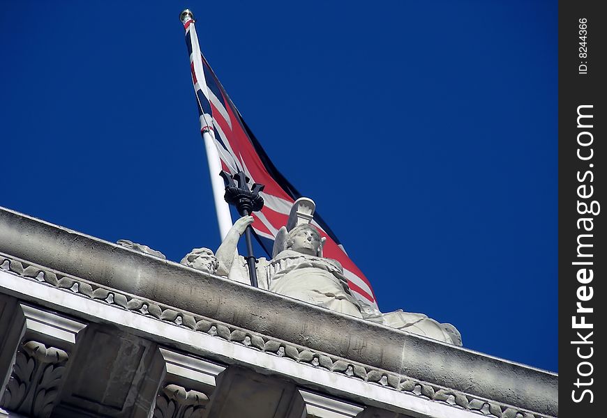 The Union Jack and the classic architecture of Admiralty Arch, London, England.