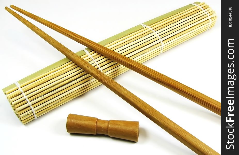 Two chinese sticks with bamboo cloth