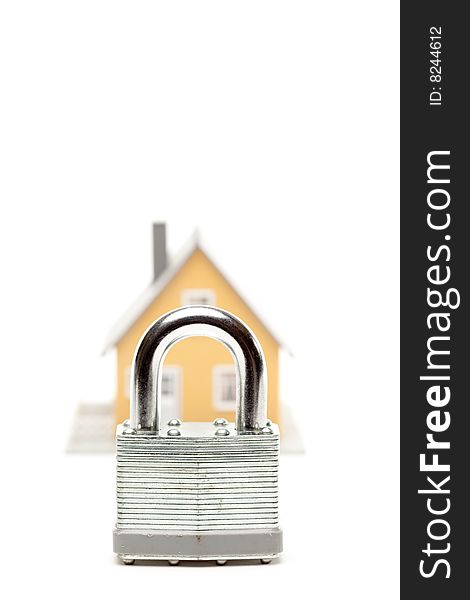 Lock and House Isolated on a White Background.