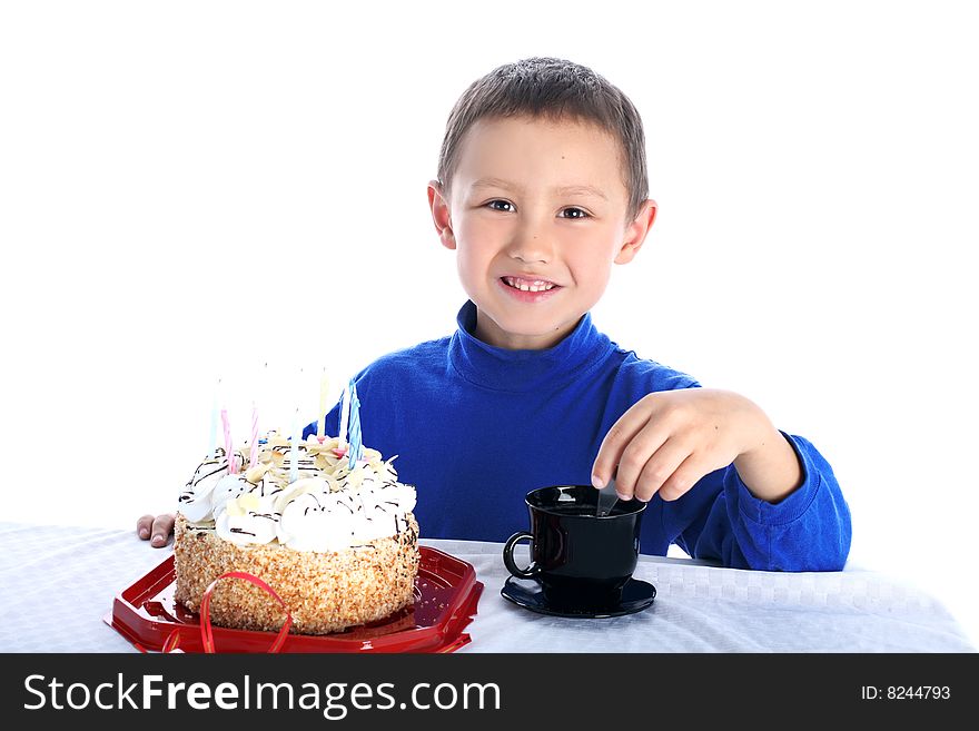 Boy with birthday cake