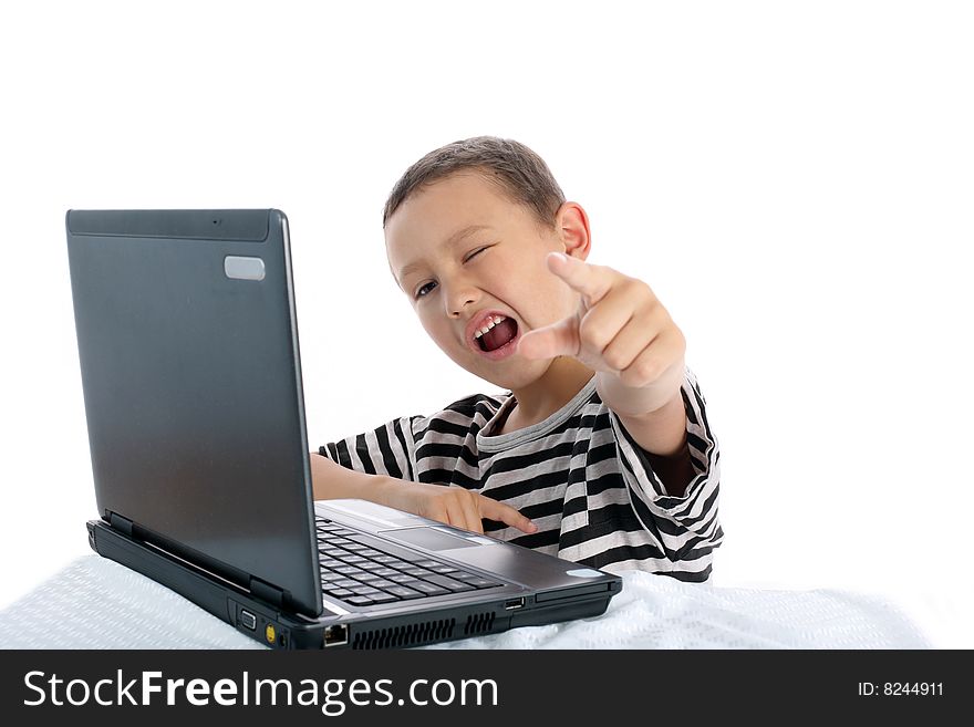 Little boy with laptop isolated on white. Little boy with laptop isolated on white