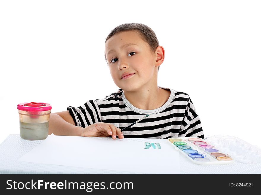Little boy with paint isolated on white