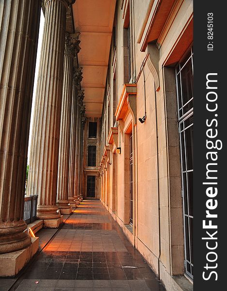 Image of pillars and the corridor of a historic building, popular for tourist attractions. Image of pillars and the corridor of a historic building, popular for tourist attractions.