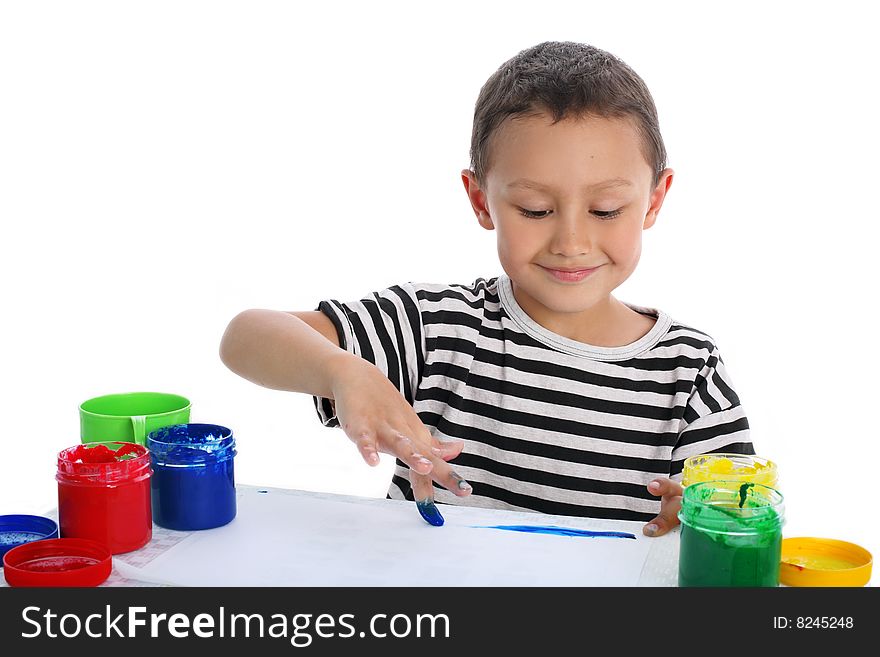 Boy with paint isolated on white