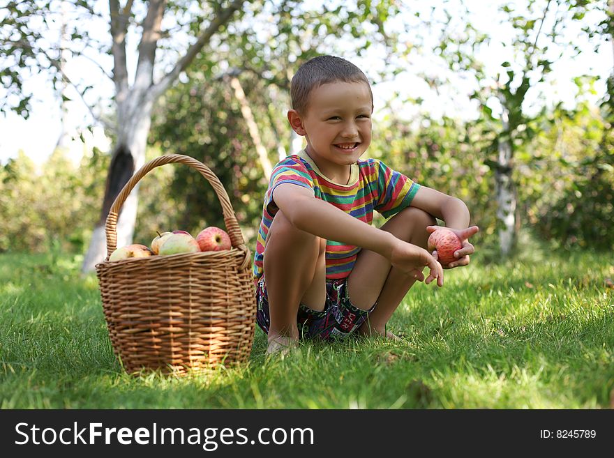 Boy with apples