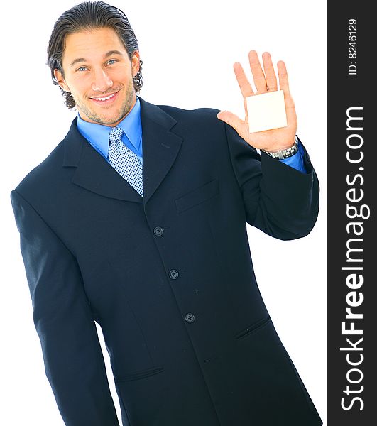 Happy young businessman showing his hand with empty post it note. Happy young businessman showing his hand with empty post it note