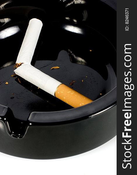 Cigarette In Ashtray