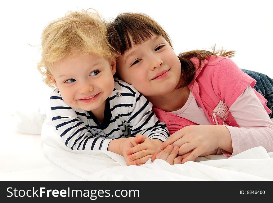 Brother and sister over white background