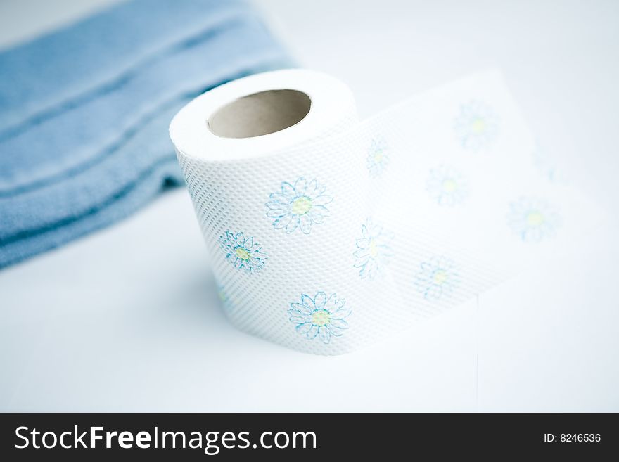 Toiletpaper rolls against bright blue background