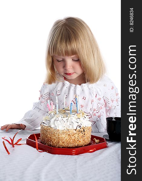 Girl with birthday cake isolated on white