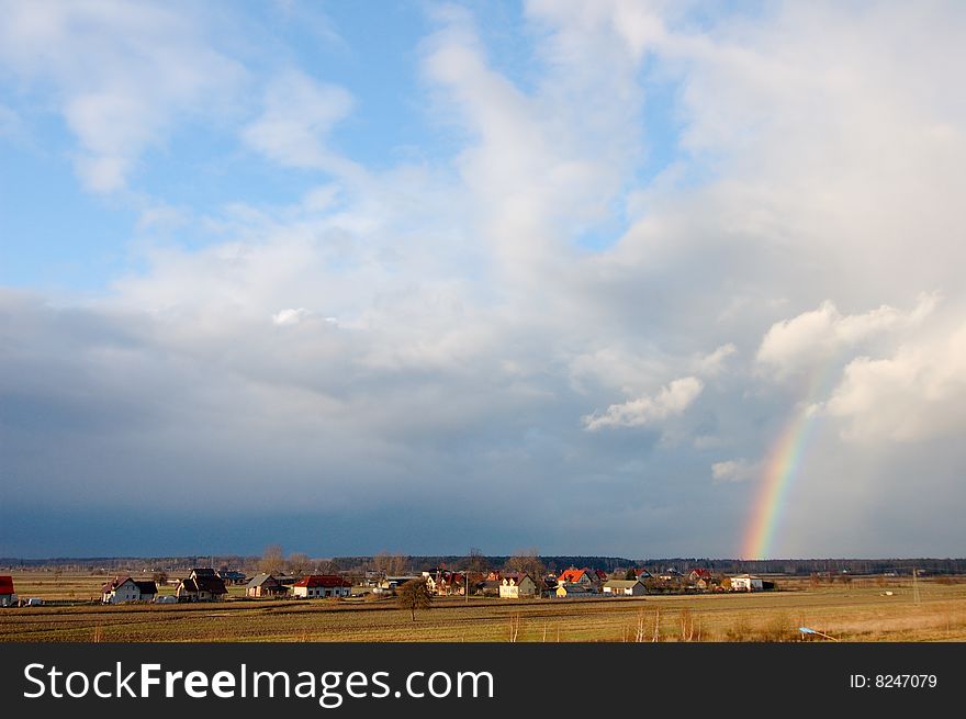 Rainbow on the blue sky