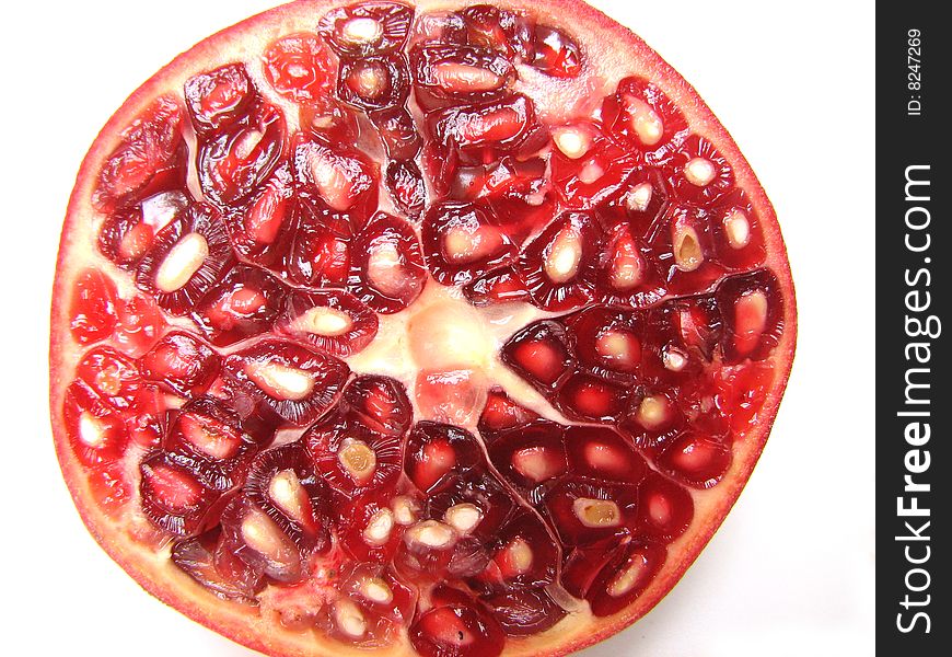 Half cut Pomegranate on white Background