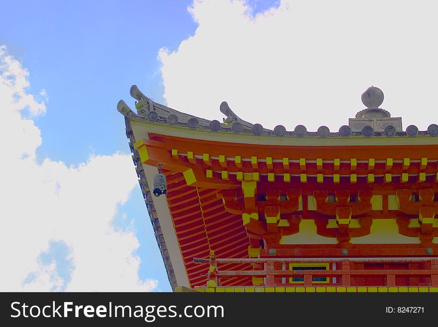 Rooftop of a Japanese temple soaring into the sky. Rooftop of a Japanese temple soaring into the sky