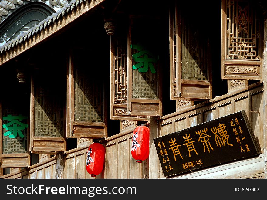 Handsome wooden windows with ornate tracery on an ancient Hakka house in the historic Sichuan Province town of Luo Dai, China - Lee Snider Photo. Handsome wooden windows with ornate tracery on an ancient Hakka house in the historic Sichuan Province town of Luo Dai, China - Lee Snider Photo.