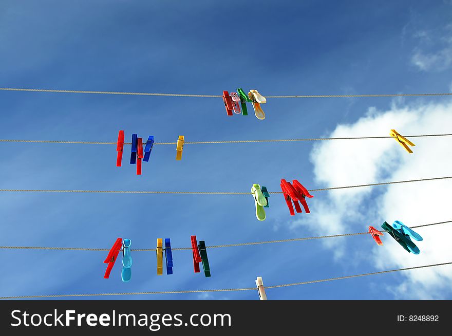 Swallows on wire waiting for lingerie