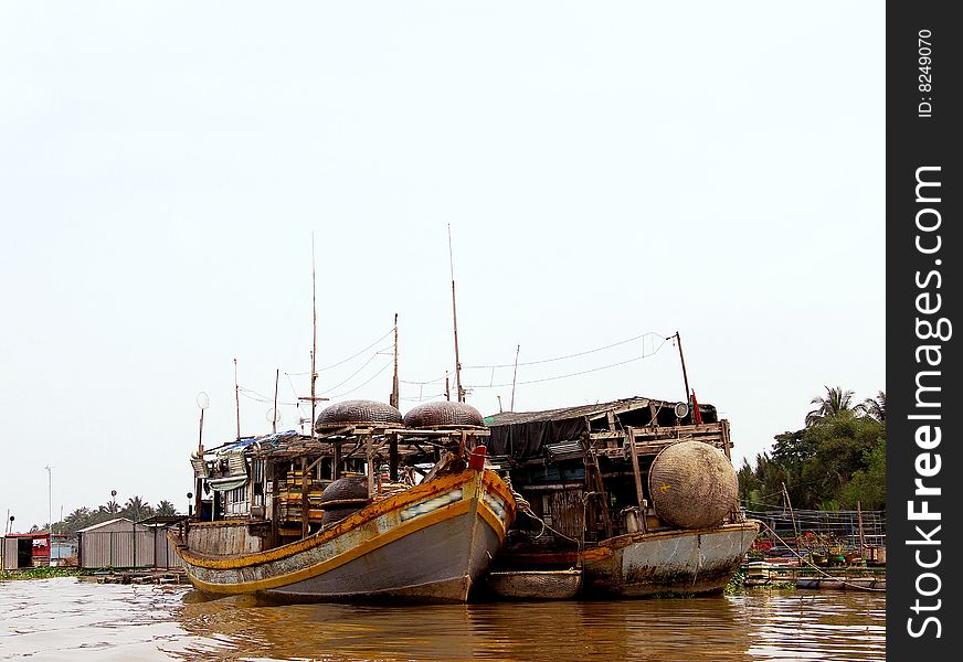 Fishing boats anchoraged in the Mekong delta in Vietnam