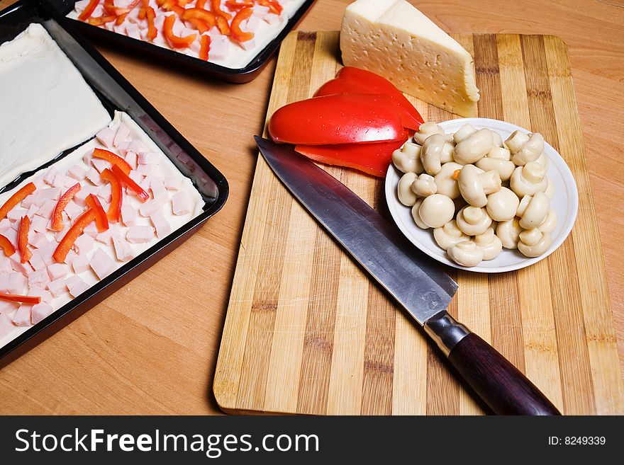 Stock photo: kitchen: an image of ingredients for pizza on the table. Stock photo: kitchen: an image of ingredients for pizza on the table