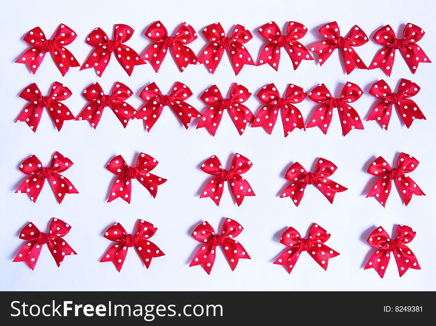 Red fabric bows, tied by hand. Red fabric bows, tied by hand.