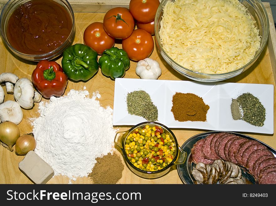 Top view at table full of fresh pizza ingredients. Top view at table full of fresh pizza ingredients