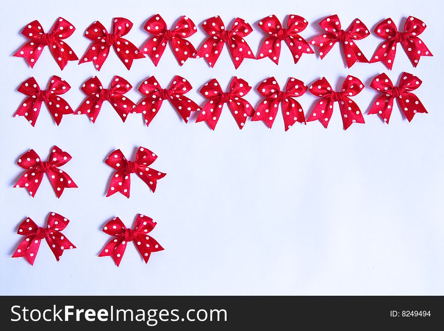 Red fabric bows, tied by hand. Red fabric bows, tied by hand.