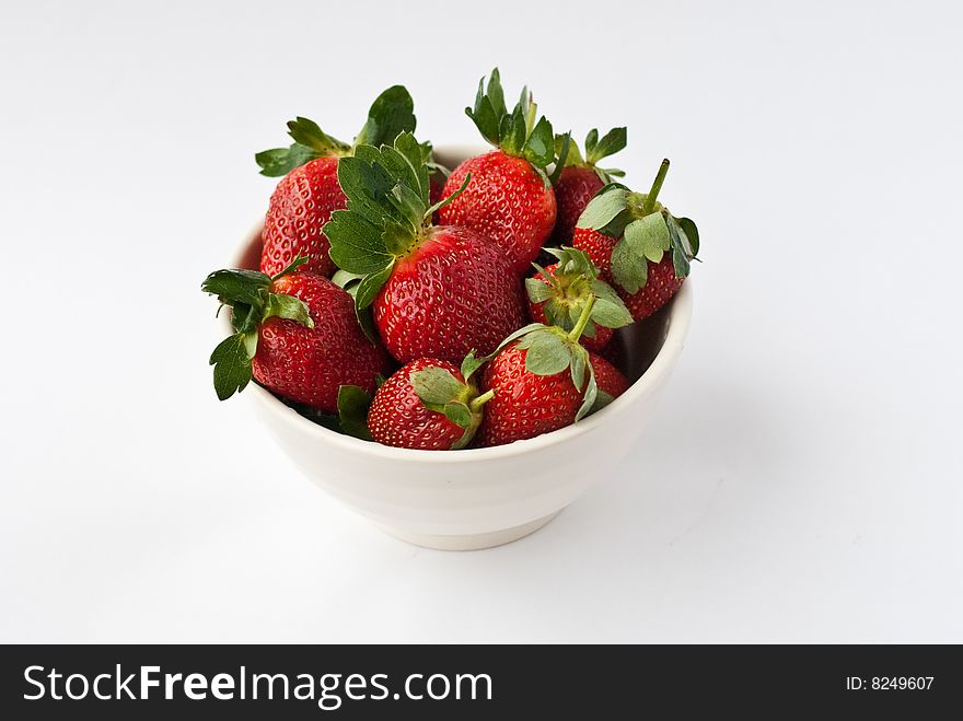 The white piala of strawberries