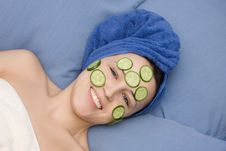 Portrait Of Woman In Towel And Mask From Cucumber Royalty Free Stock Image