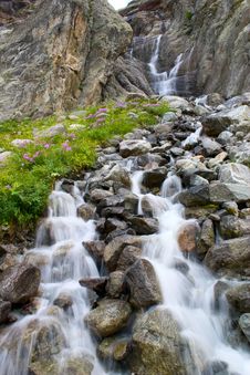 Waterfall In Mountains Royalty Free Stock Images
