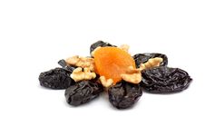 Dried Apricot,walnuts And Prunes On A White. Stock Images Dried Apricot,walnuts And Prunes On A White. Stock Images