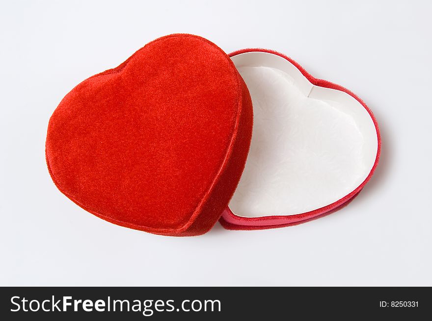 Heart shaped red gift box, isolated on white. Heart shaped red gift box, isolated on white