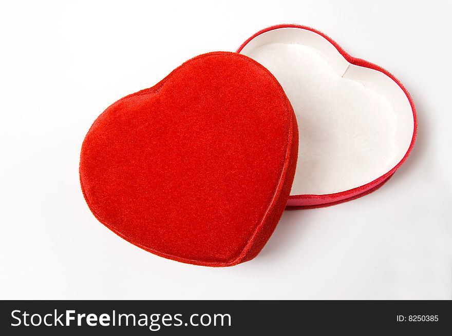 Heart shaped red gift box, isolated on white. Heart shaped red gift box, isolated on white