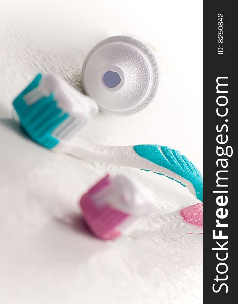 Toothpaste and toothbrushes closeup. dental care