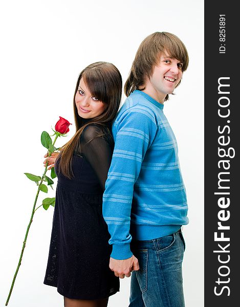 Young couple with rose, isolated on white background