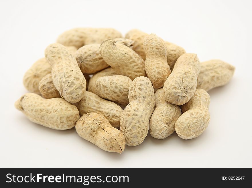 Isolated peanuts on white background
