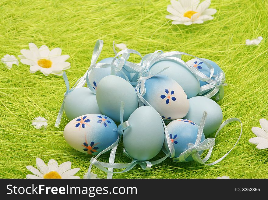 Painted Colorful Easter Eggs on green Grass