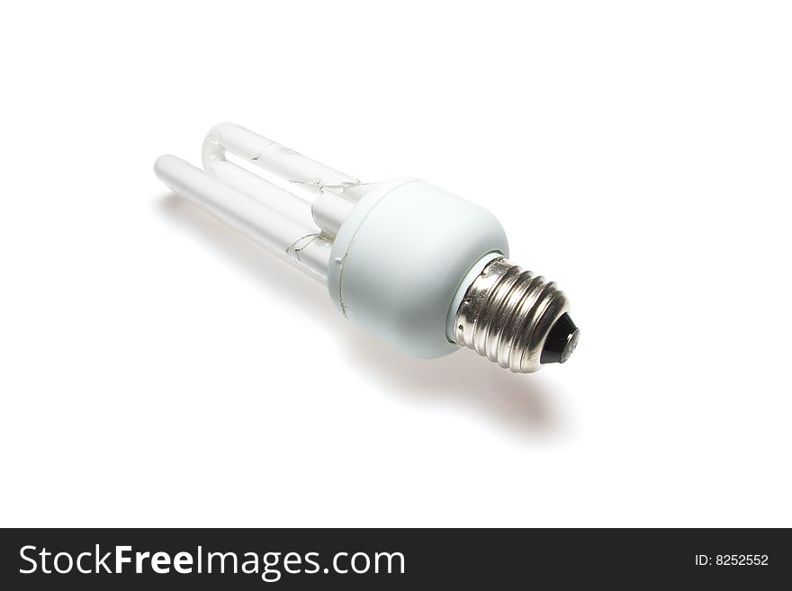 Broken fluorescent lamp isolated over white. Broken fluorescent lamp isolated over white