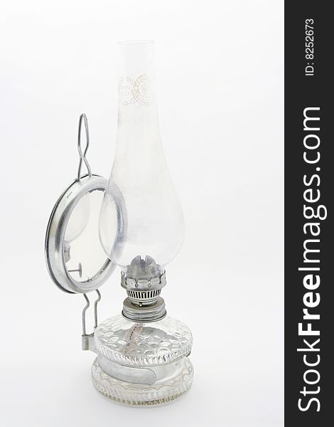 Old petroleum lamp on white background. Old petroleum lamp on white background