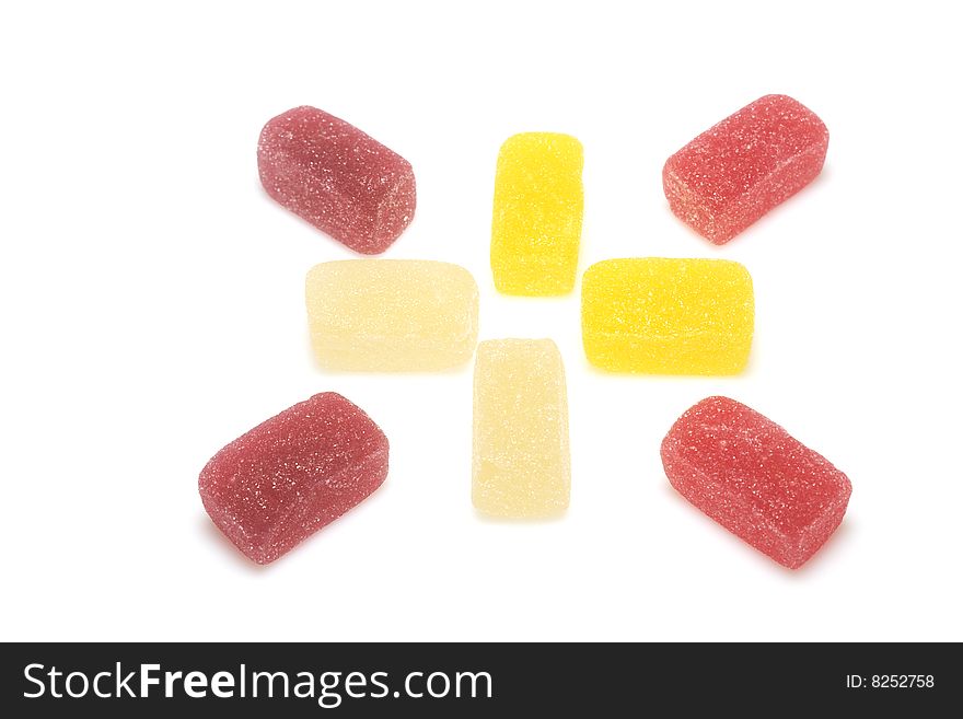 Many-colored candies isolated over white
