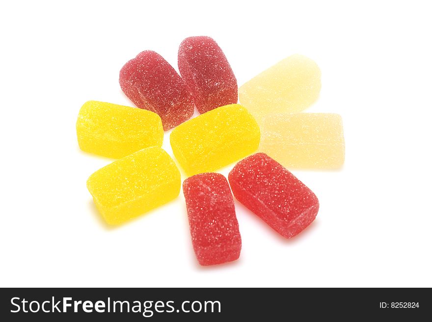 Many-colored candies isolated over white
