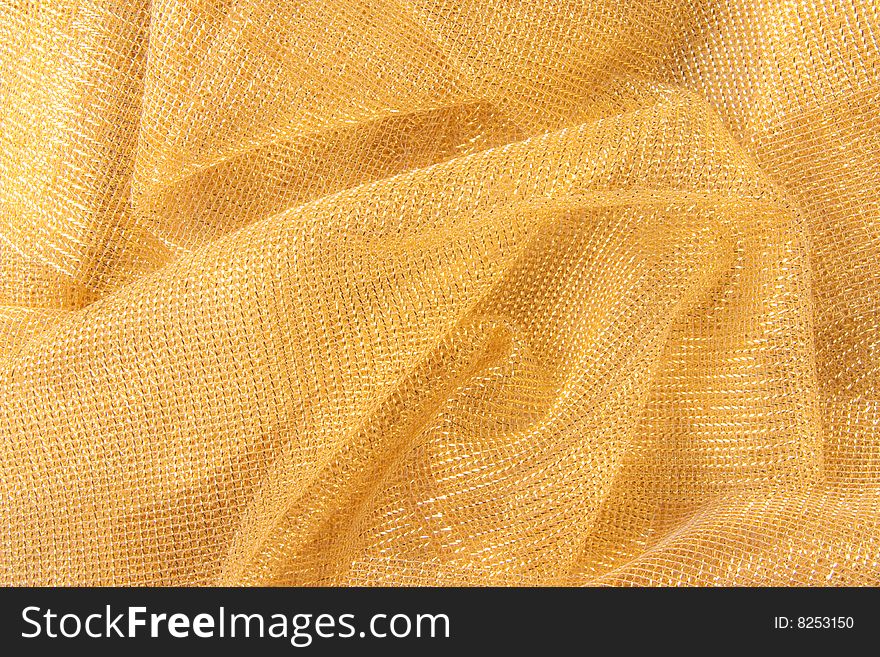 Details of golden color cloth, use to wrap gift. Details of golden color cloth, use to wrap gift.